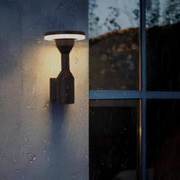 A modern LED outdoor wall light suitable for driveway and garage lighting