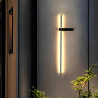 Solar garden light illuminating a backyard pathway