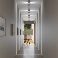 A modern black ceiling light with LED features