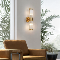 Elegant led wall light in gold and copper with crystal decorative features for indoor use
