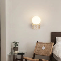 A decorative wall lamp in a modern living room setting
