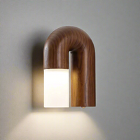 A variety of wooden, modern, and contemporary wall lights for indoor use