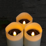 Solar powered candle and outdoor solar lanterns illuminating a garden pathway