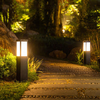 Outdoor lighting and garden lighting setup with landscape light and bollard light on patio