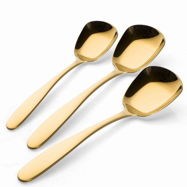 Gold cutlery set with gold kitchen accessories