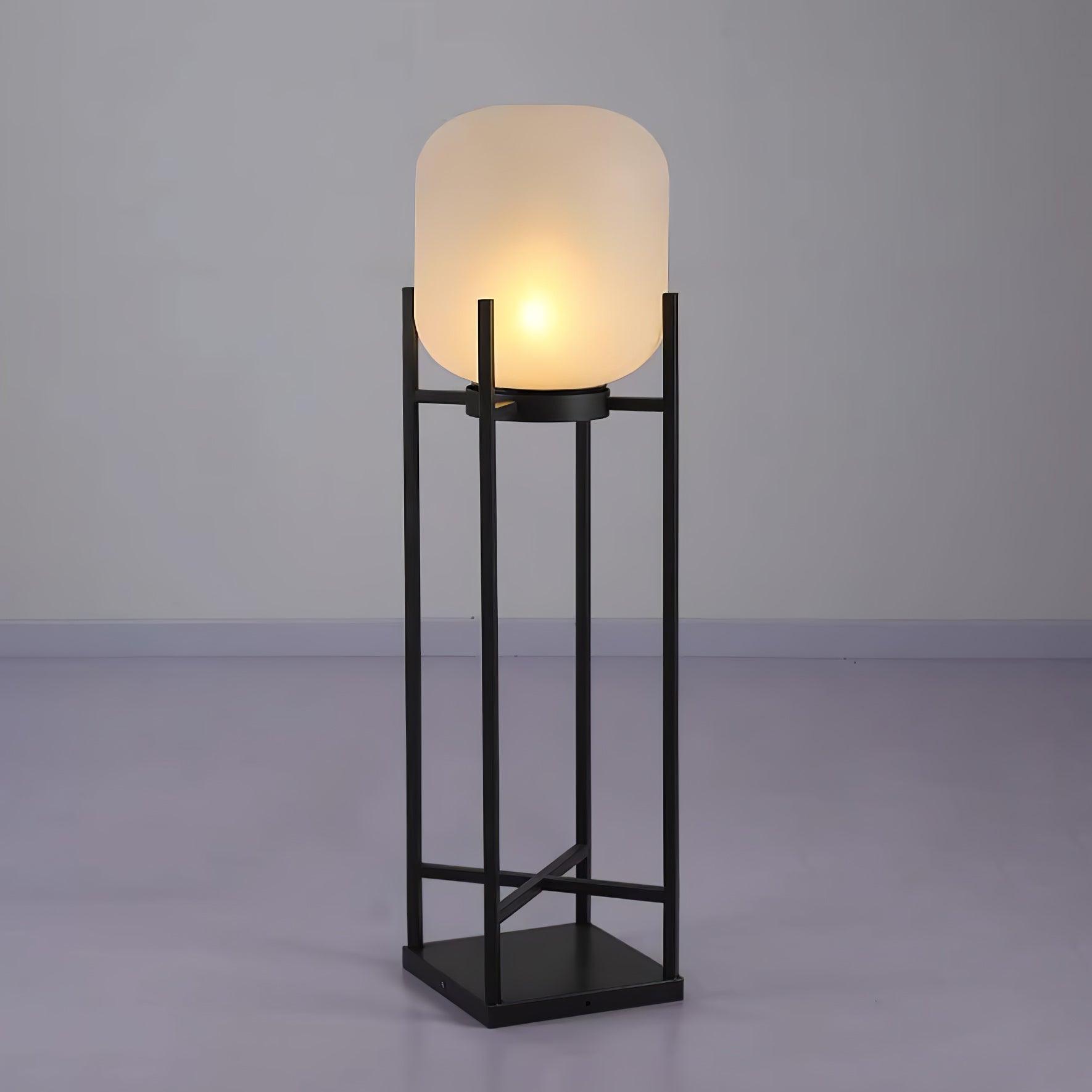 Modern outdoor solar lantern illuminating a garden pathway