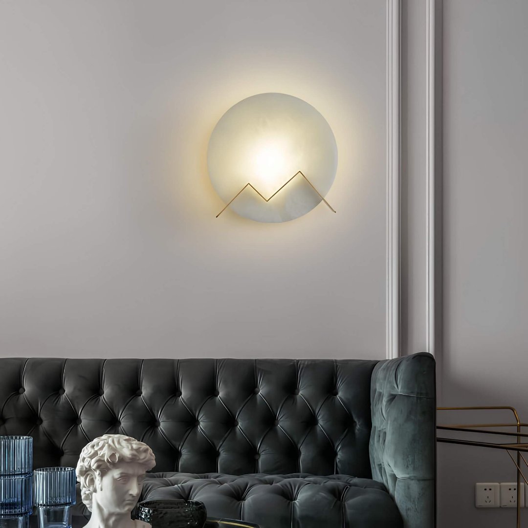 A sleek modern contemporary LED wall light illuminating a living room