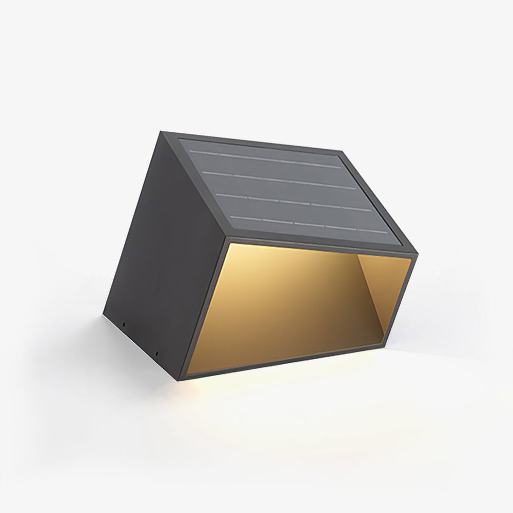 A solar garden light illuminating a pathway in an outdoor setting
