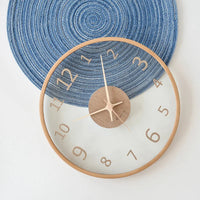 A modern wall clock with a unique design perfect for living room decor