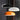 Modern pendant lighting in a dining room with glass pendant lights over dining table