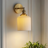 Modern ceramic wall light sconce providing LED lighting
