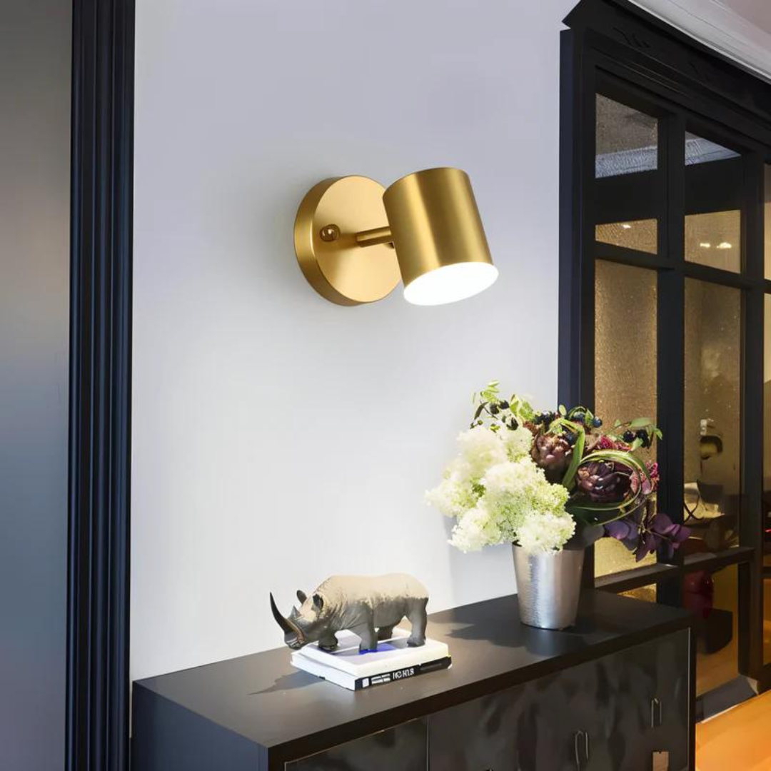 A contemporary black LED wall light installed indoors