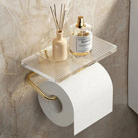 Gold toilet paper holder with wall mount and shelf