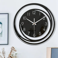 Black modern wall clock with a silent mechanism