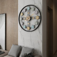 A vintage wall clock with an antique silent mechanism, perfect for a living room