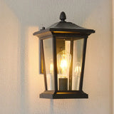 Outdoor wall lamp installed in a garden providing light