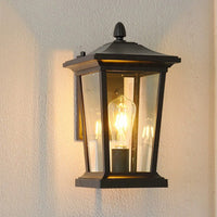 Outdoor wall lamp installed in a garden providing light