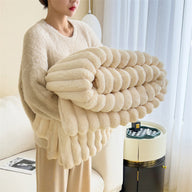 Luxurious faux fur throw and sofa blanket in a living room setting