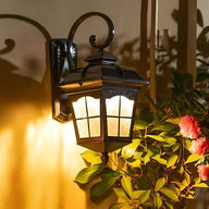 Black LED modern outdoor wall light mounted on an exterior wall