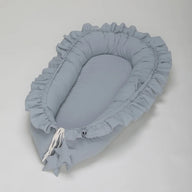 Lightweight and portable travel bed and co-sleeper designed for the comfort and safety of newborns