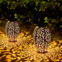 A solar lantern used as an outdoor garden solar light