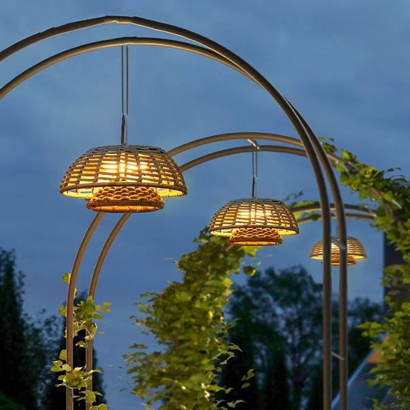 Various outdoor lights and solar garden lighting options displayed in a landscape setting