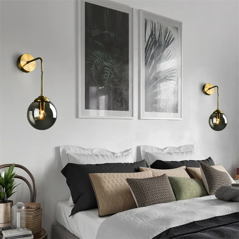 A selection of modern and decorative glass wall lights featuring scandi design for indoor use