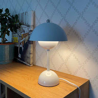 LED modern metal dimmable table lamp on a bedside