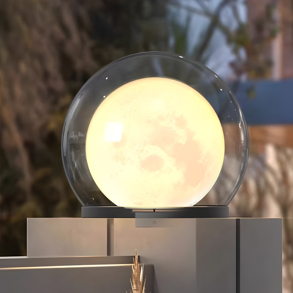 Solar-powered garden pathway light illuminating a stone pathway