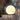 Solar-powered garden pathway light illuminating a stone pathway