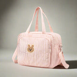 A spacious and stylish diaper bag, perfect for organizing baby essentials