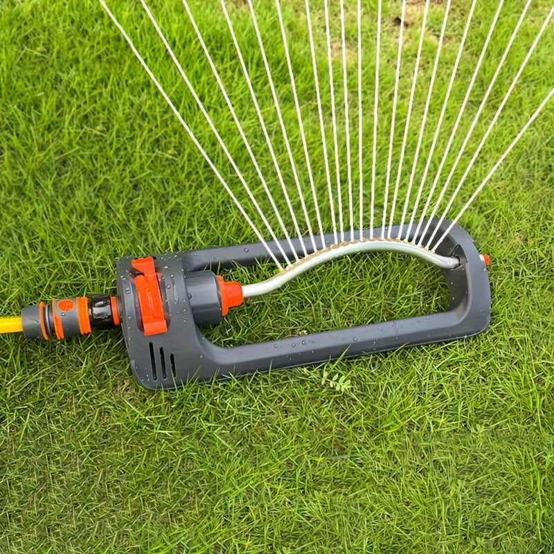 A versatile garden sprinkler system on a lush lawn